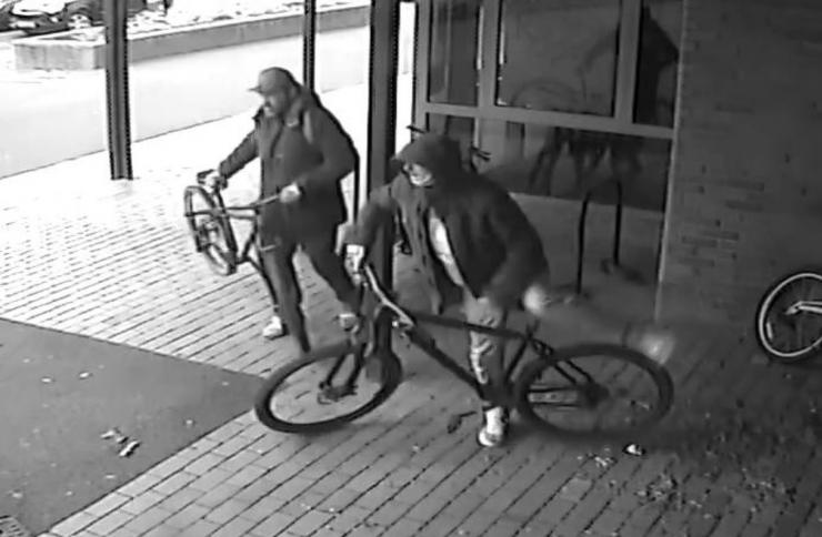 Can you identify the people in this CCTV image?