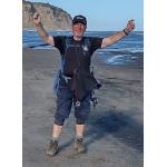 Allen Graham completing the Coast to Coast walk at Robin Hood's Bay