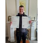 John Radcliffe with his certificate