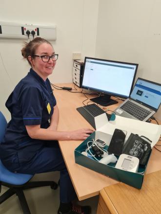 Heather Stroud, Lead Respiratory Nurse (Virtual Wards) showing the Doccla system and equipment for respiratory patients.