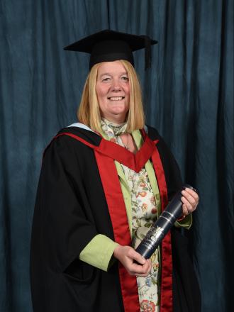 Tracy Harrison picking up her honorary degree