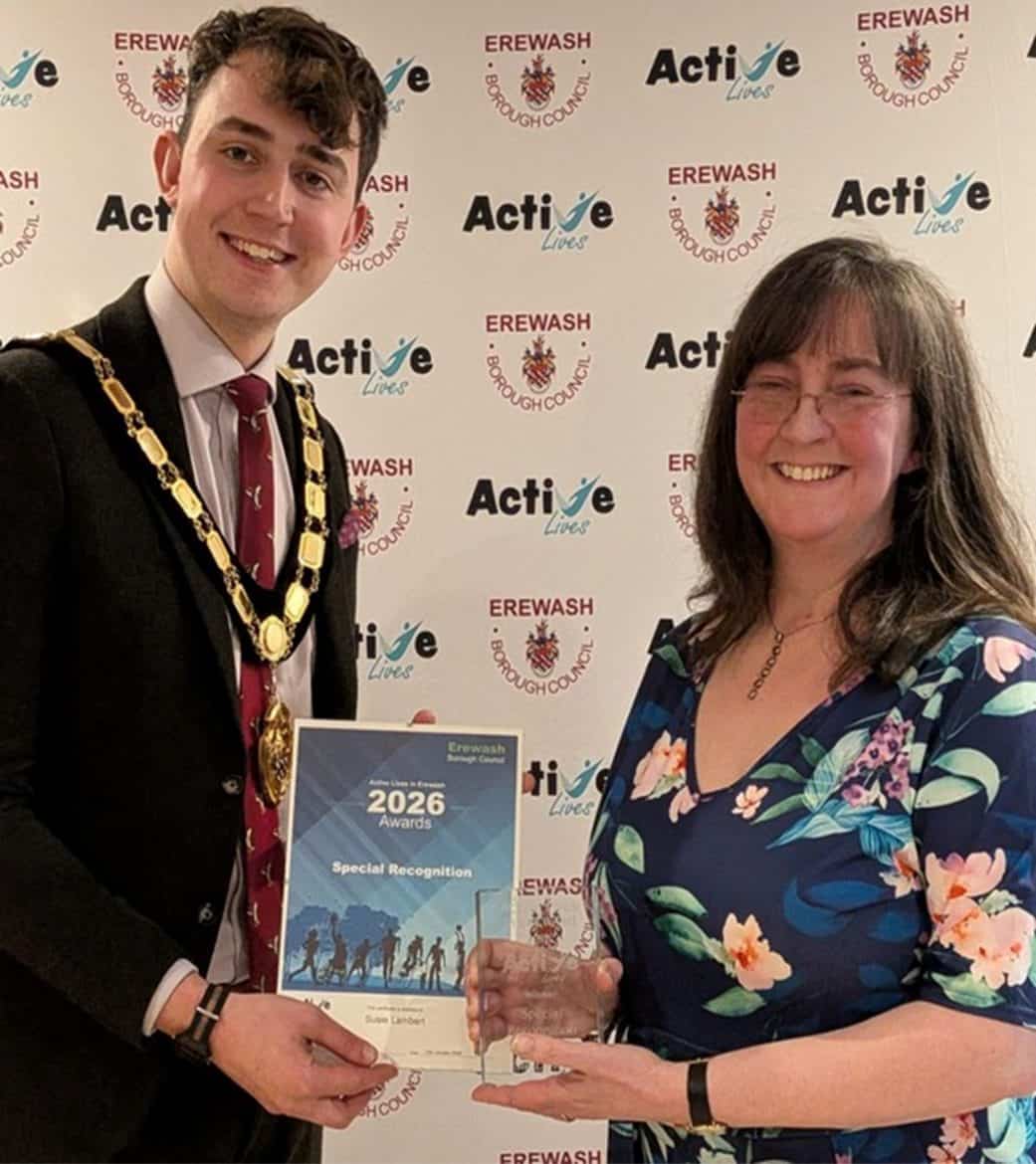 Winning smiles . . . Mayor presents inspirational Susie with Active Lives award