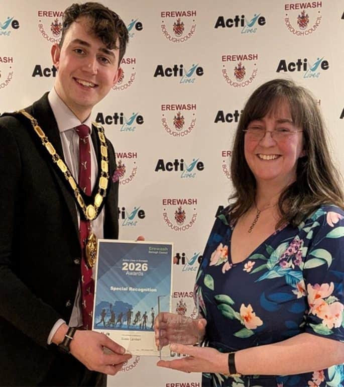 Winning smiles . . . Mayor presents inspirational Susie with Active Lives award