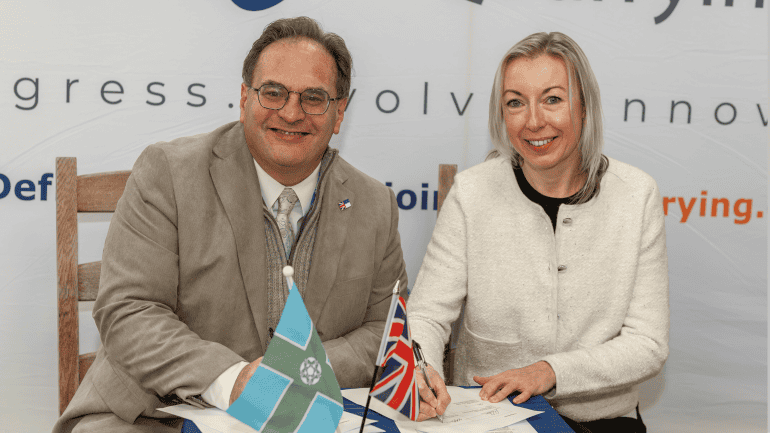Positive sign: Deputy Leader of Derbyshire County Council Councillor Rob Reaney, left, and Helen Bailey, Deputy Chair of the Institute of Quarrying, sign a Memorandum of Understanding.
